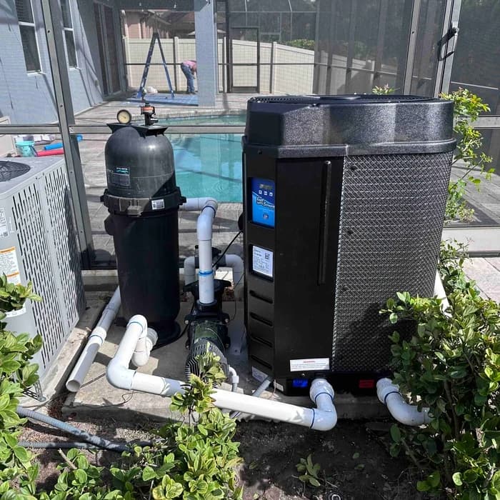 Gulfstream heat pump installed beside a screened pool